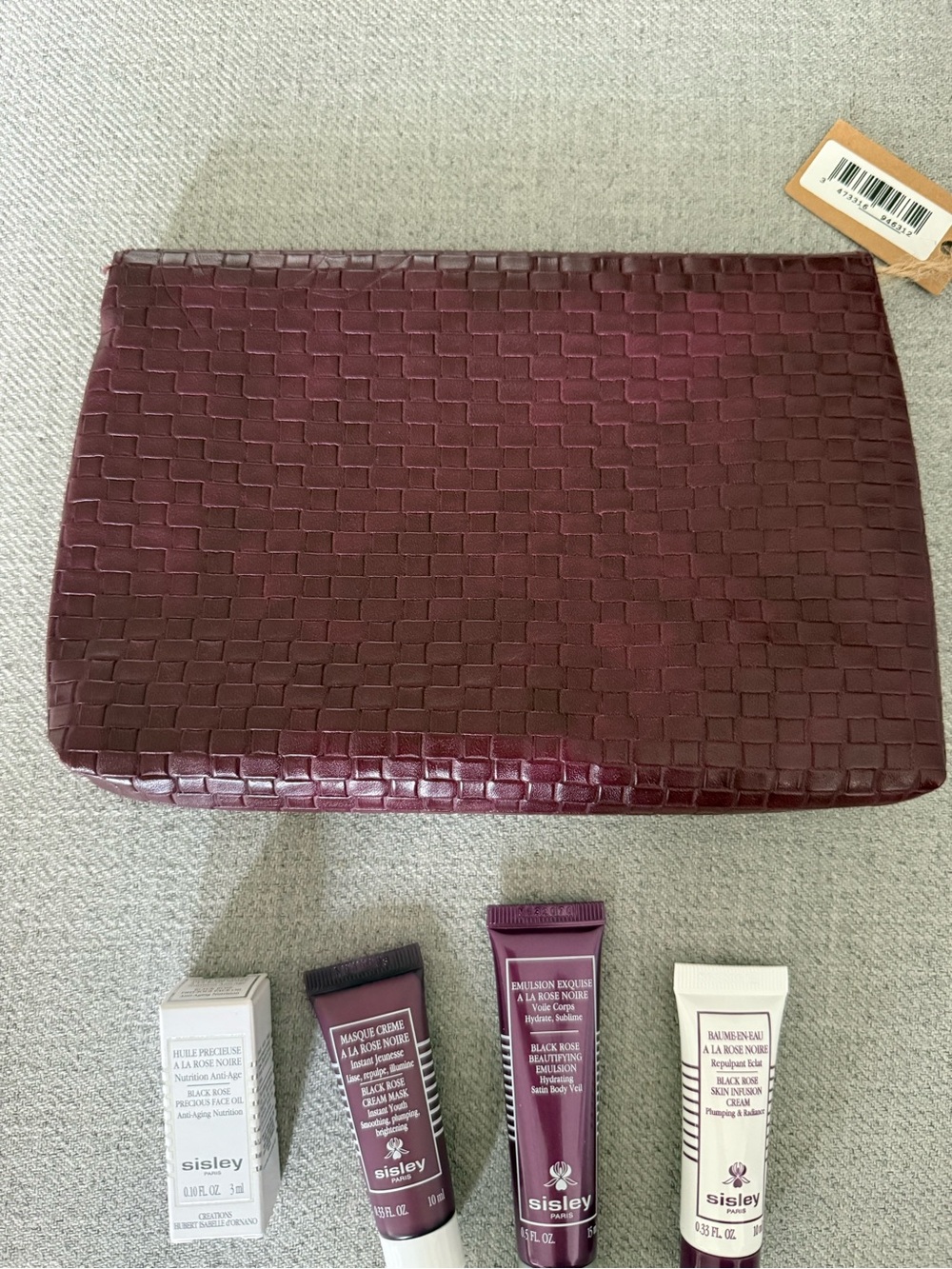 Sisley Woven Plum Cosmetic Clutch with Skincare samples - Picture 4 of 7